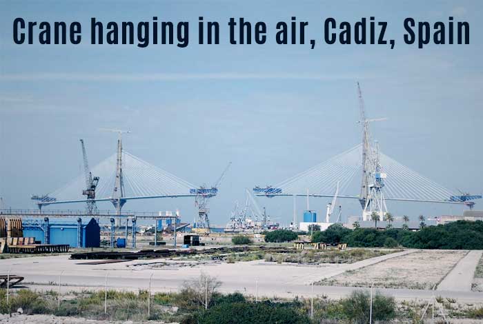 Crane hanging in the air, Cadiz, Spain